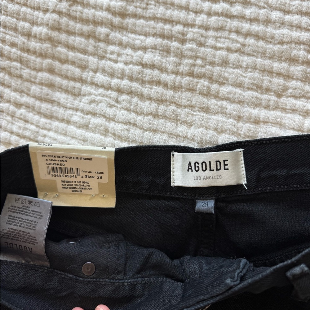 Agolde never worn black jeans. Size 29. High rise 90s pinch waist, straight leg.
